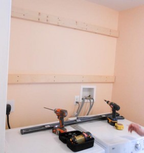 how to install cabinets on the wall